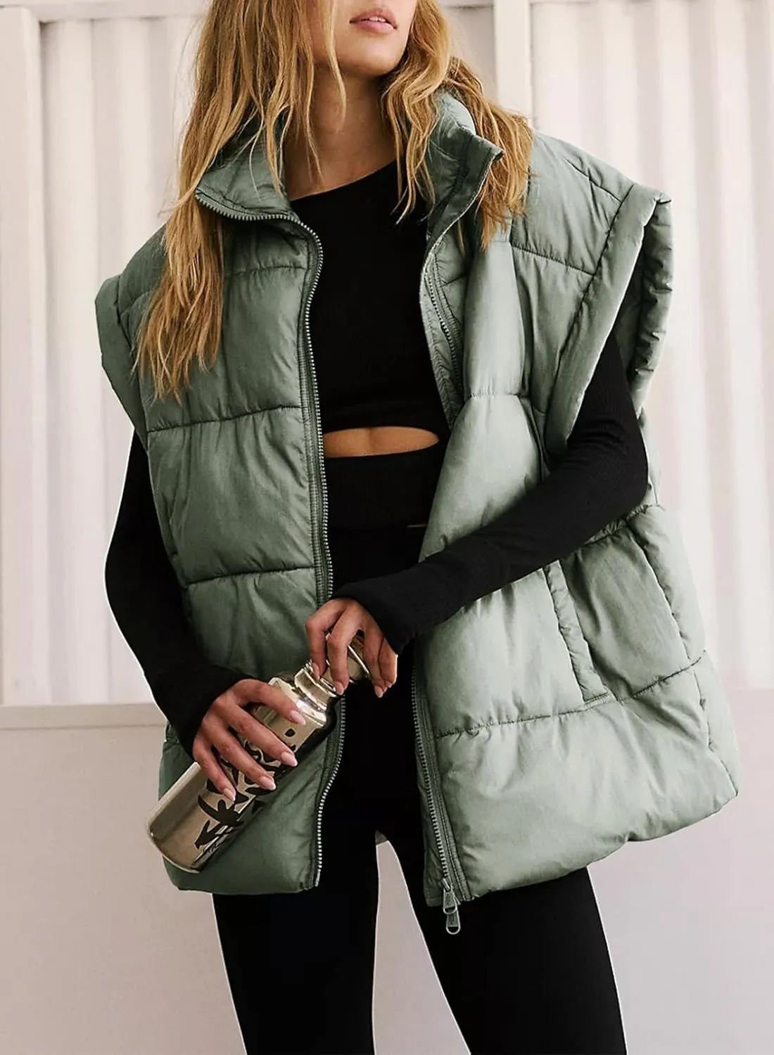 Dokotoo Women's Casual Winter Oversized Puffer Vest Stand Collar Flysleeve Insulated Padded Puffy Jackets Coat with Pockets